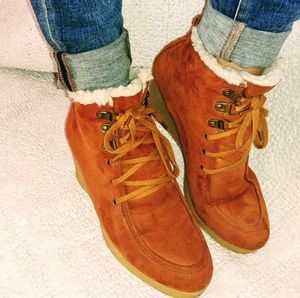 Lace up wedge bootie.